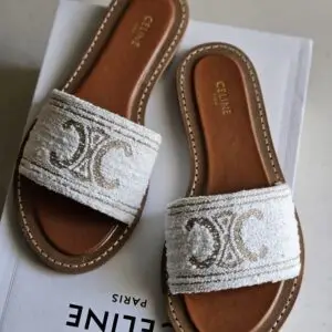 CELINE Luxe Woven Leather Mule Sandals