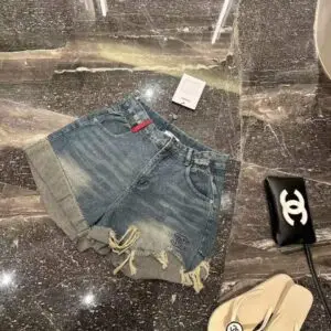 CHANEL High Waist Curved Denim Shorts