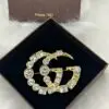 GUGGI Gg Brooch