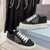 PRADA Double Wheel Black Nylon Sneakers